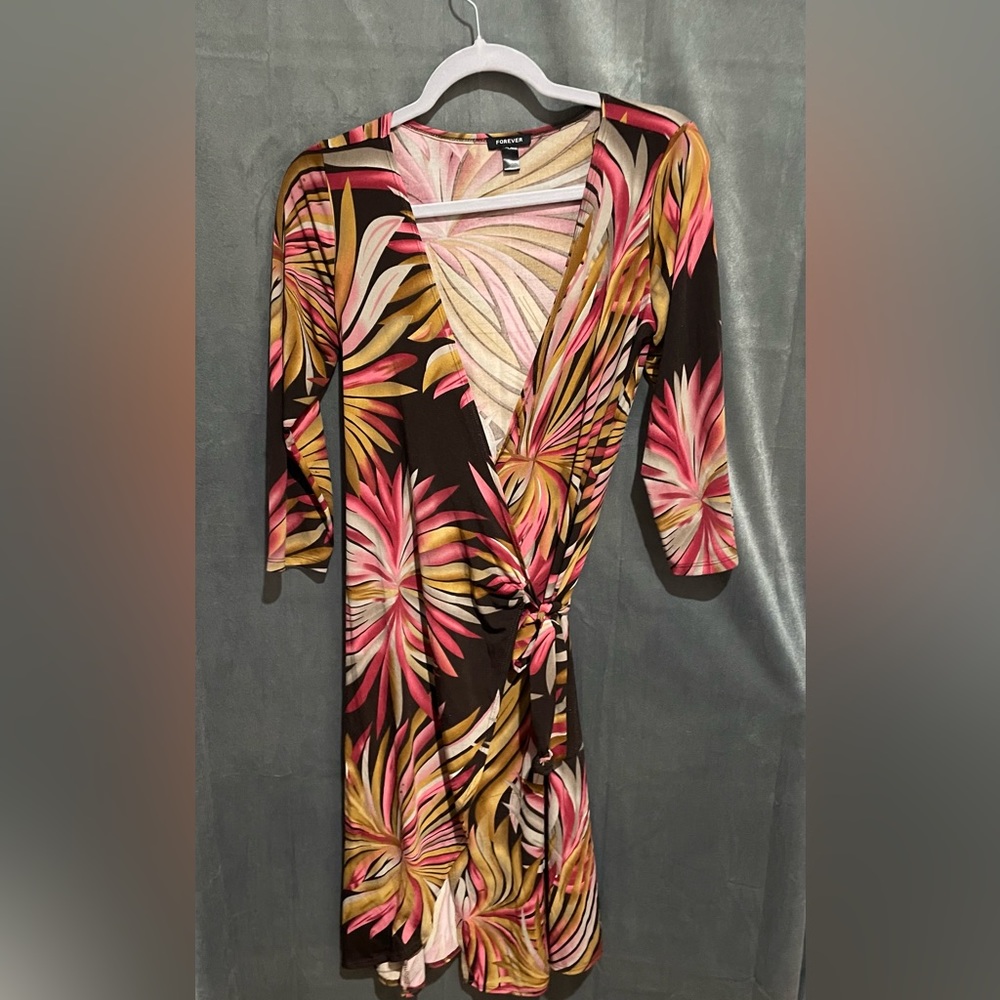 Wrap dress by FOREVER PTP 19x39 long it’s not as low cut as it looks see pic